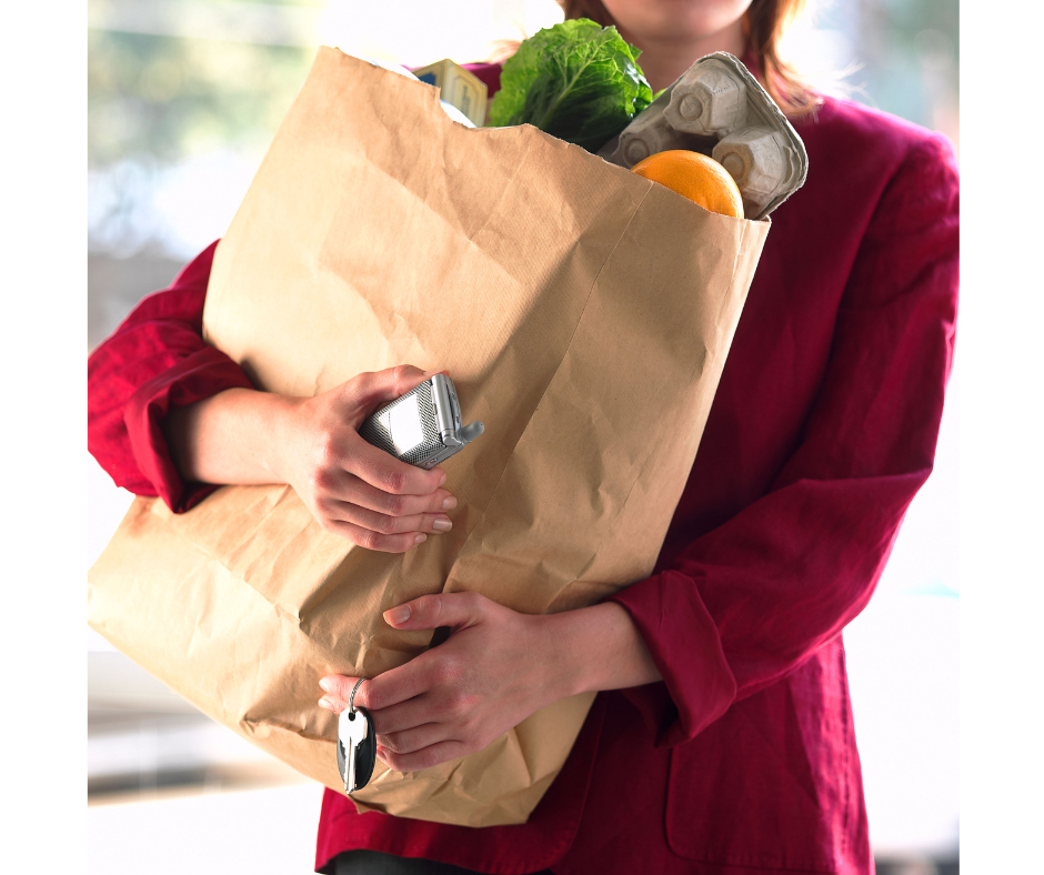woman carrying groceries 